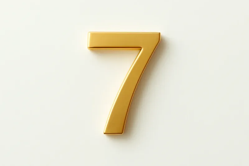 Large golden seven symbol on cream background with soft shadow